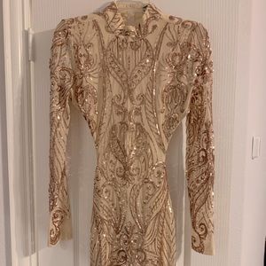 Long sleeve, backless, cream dress with rose gold sequins size M.